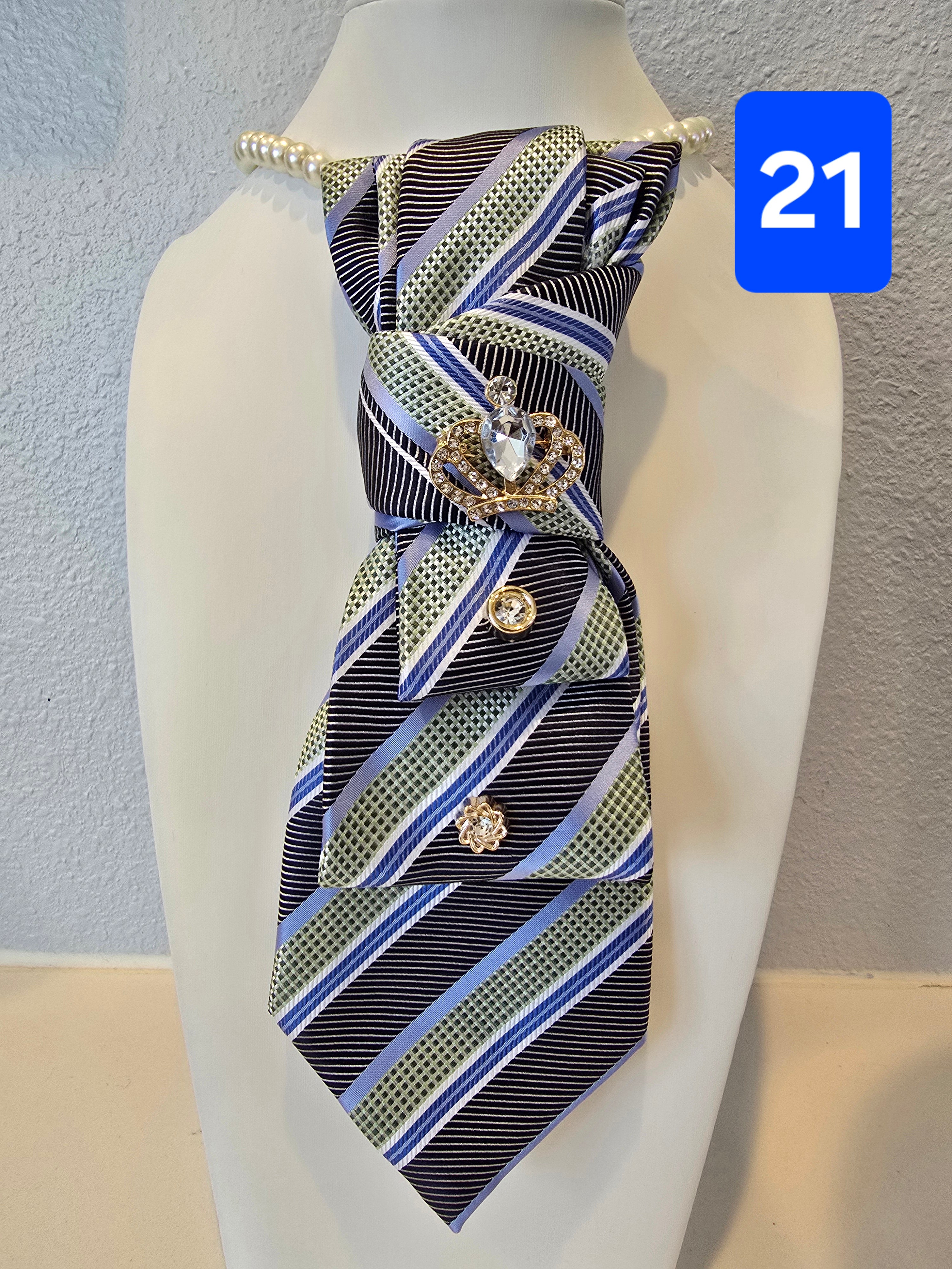Reign in Style – Blue, Green & Gray Striped Tie with Crown Brooch Accent